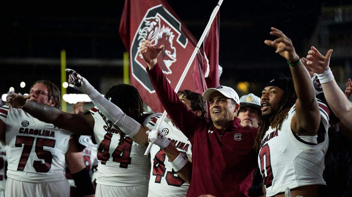 South Carolina Gamecocks head coach Shane Beamer sings the fight song with his team towards the fans after their win against Vanderbilt Commodores at FirstBank Stadium in Nashville, Tenn., Saturday, Nov. 9, 2024.