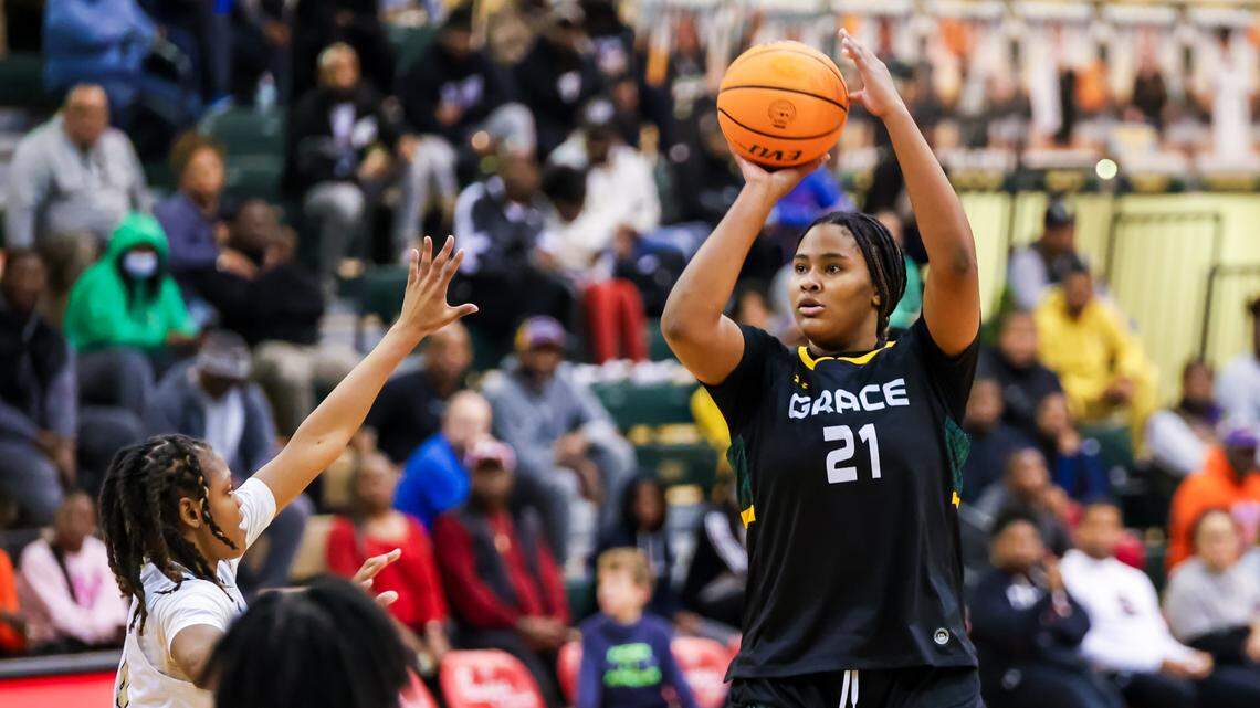 Grace Christian Lions forward Sarah Strong (21) makes a three pointer at the Chick-fil-A Classic at River Bluff High School Wednesday, Dec. 27, 2023.