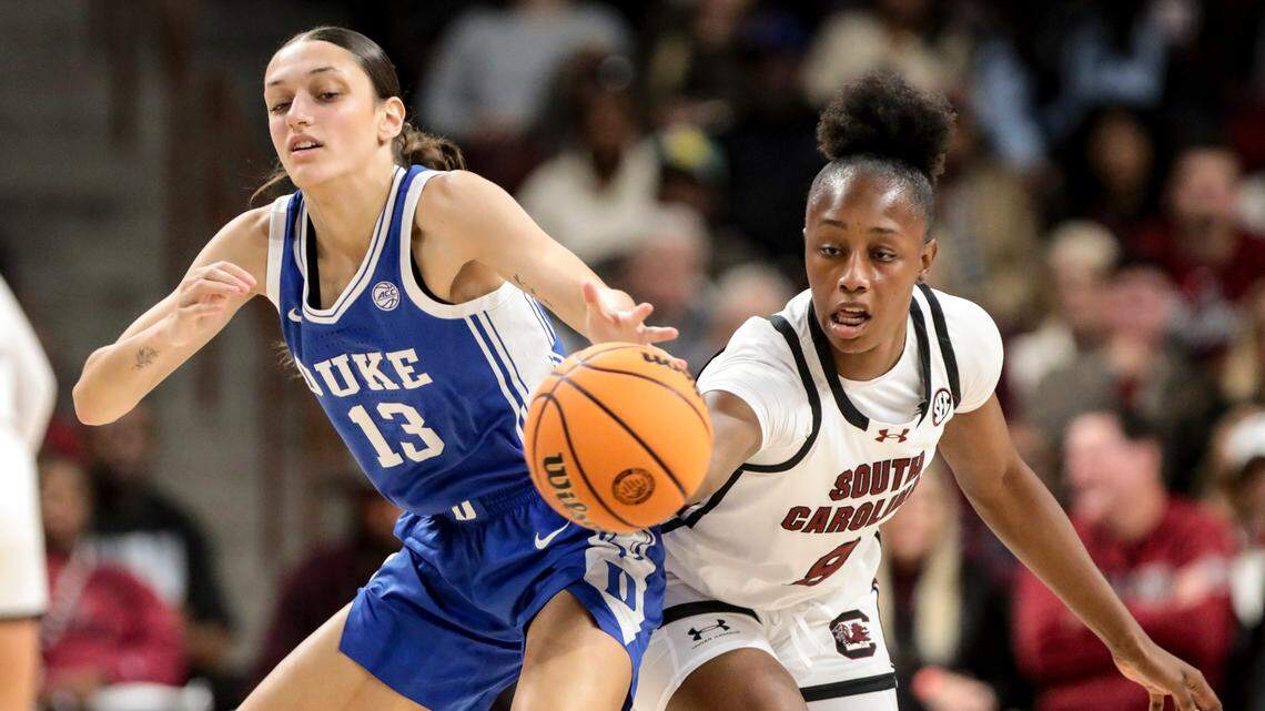 University of South Carolina forward Joyce Edwards (8) swipes the ball from Duke University’s Jordan Wood (13) during the first half of action in the Colonial Life Arena on Thursday Dec. 5, 2024.