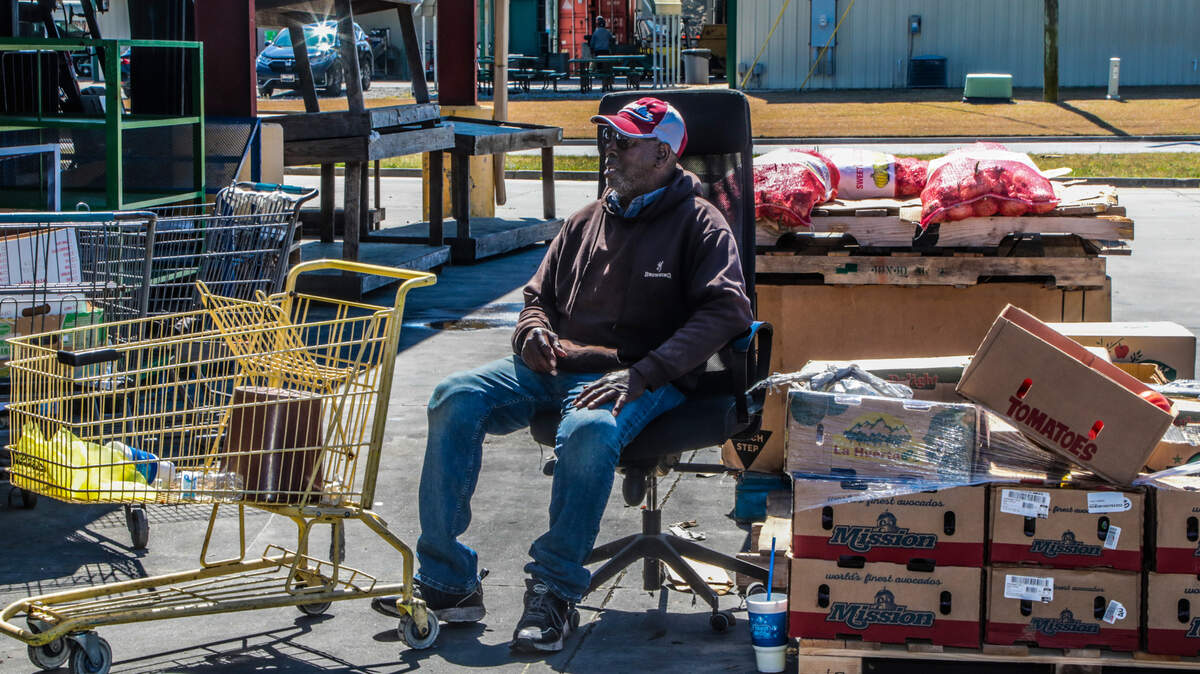 Ernest Mazyck operates a produce stall at the South Carolina State Farmers Market. He operated at the former market before its closure in 2010 when the new market opened.
