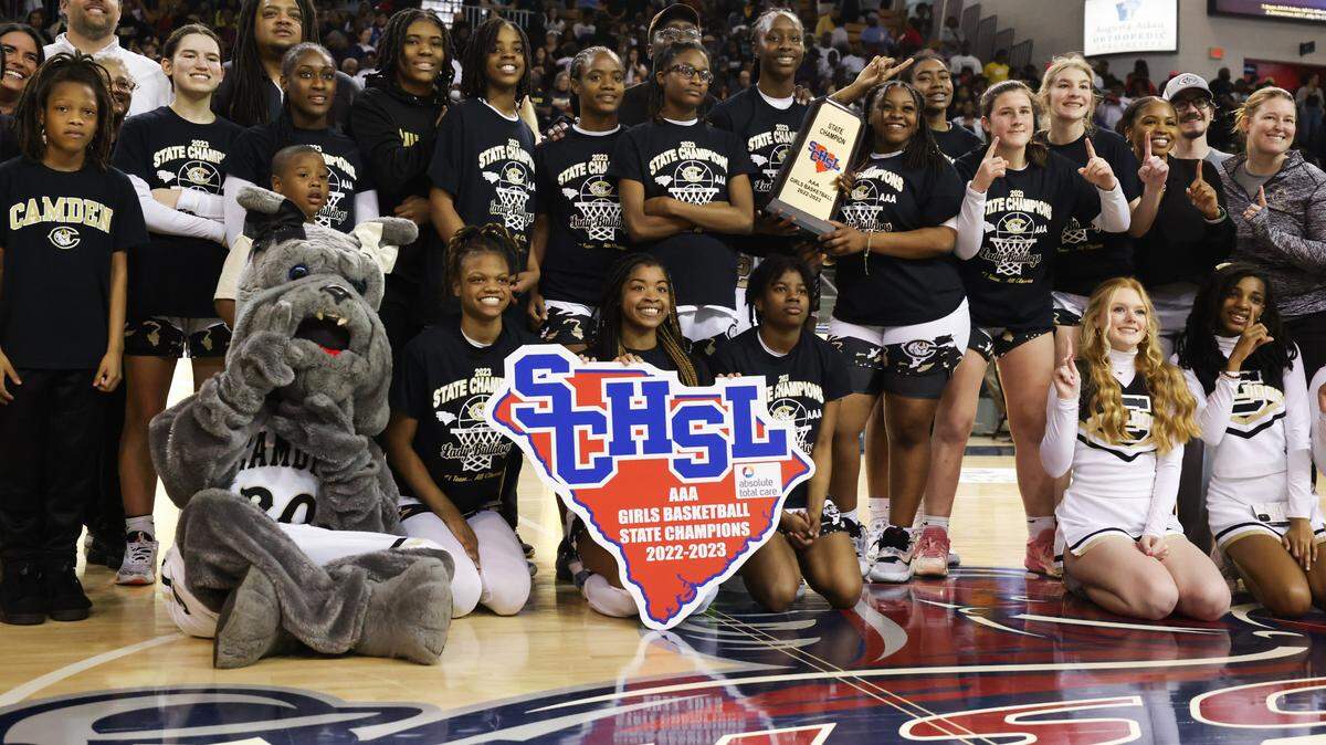 Camden players celebrate following their win over Wren in the SCHSL Class 3A State Championship at the USC Aiken Convocation Center on Friday, March 3, 2023.