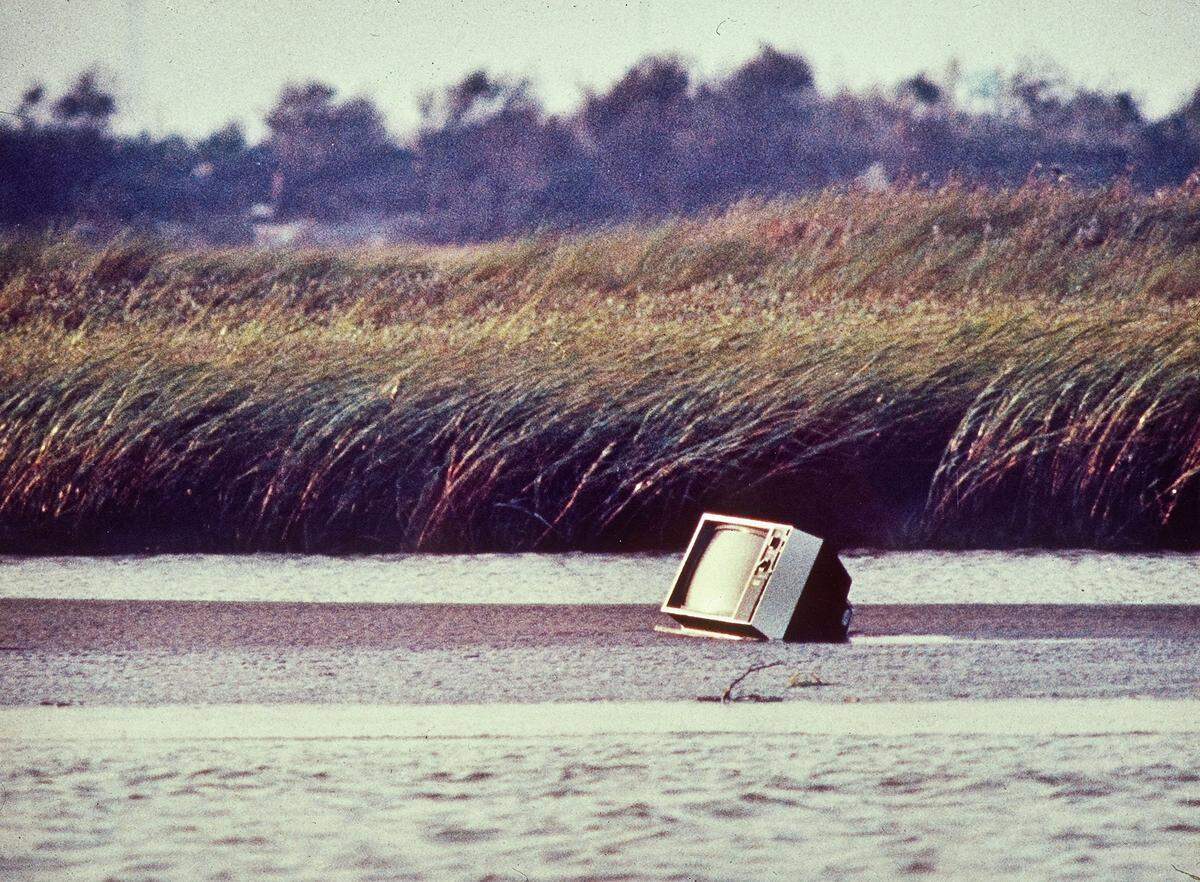 Hurricane Hugo devastated the South Carolina coastline and inland communities on September 21st and 22nd 1989. A television sits quietly on a sandbar on the Intracoastal Waterway.