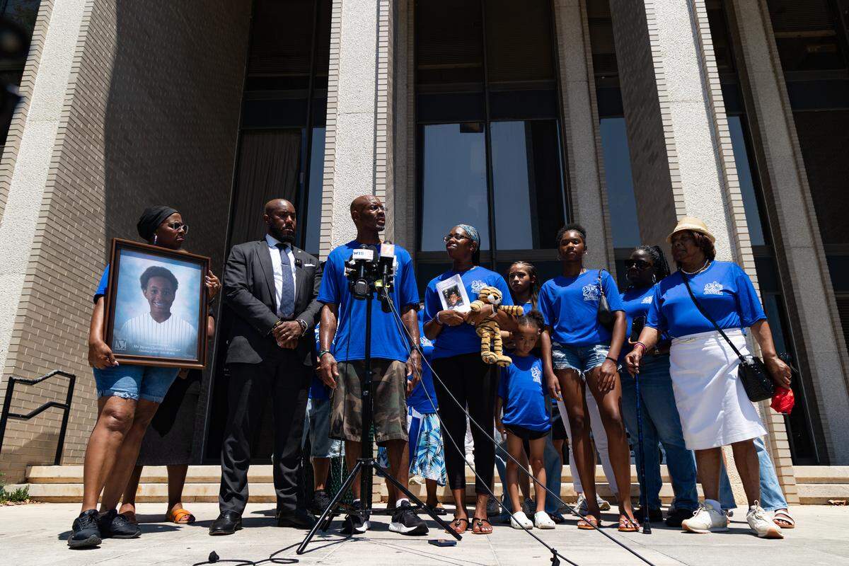 Clarence and Ebony Carr, parents of Jaysen Carr, a 12-year-old student at Hand Middle School, died on July 18 from a rare infection of the Naegleria fowleri amoeba, speak outside of the South Carolina Department of Environmental Services building in Columbia, South Carolina on Tuesday, July 29, 2025.