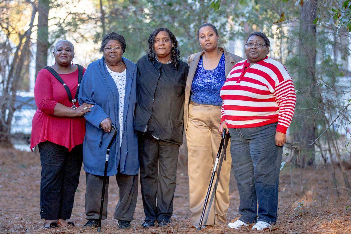 Freddie Johnson, left, Lucille Williams, Angela Brown, Sabrina Williams, and Margaret Williams stand together after spending the afternoon with family and friends.