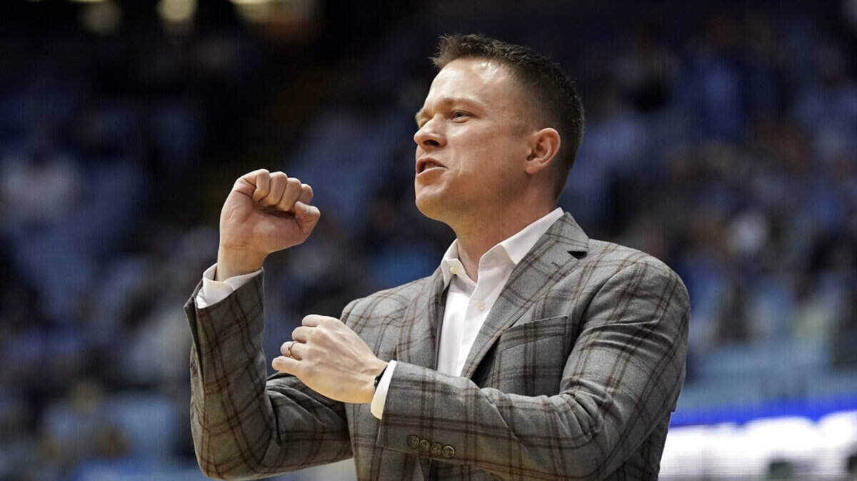 Furman head coach Bob Richey directs his players during the first half of an NCAA college basketball game against North Carolina in Chapel Hill, N.C., Tuesday, Dec. 14, 2021.