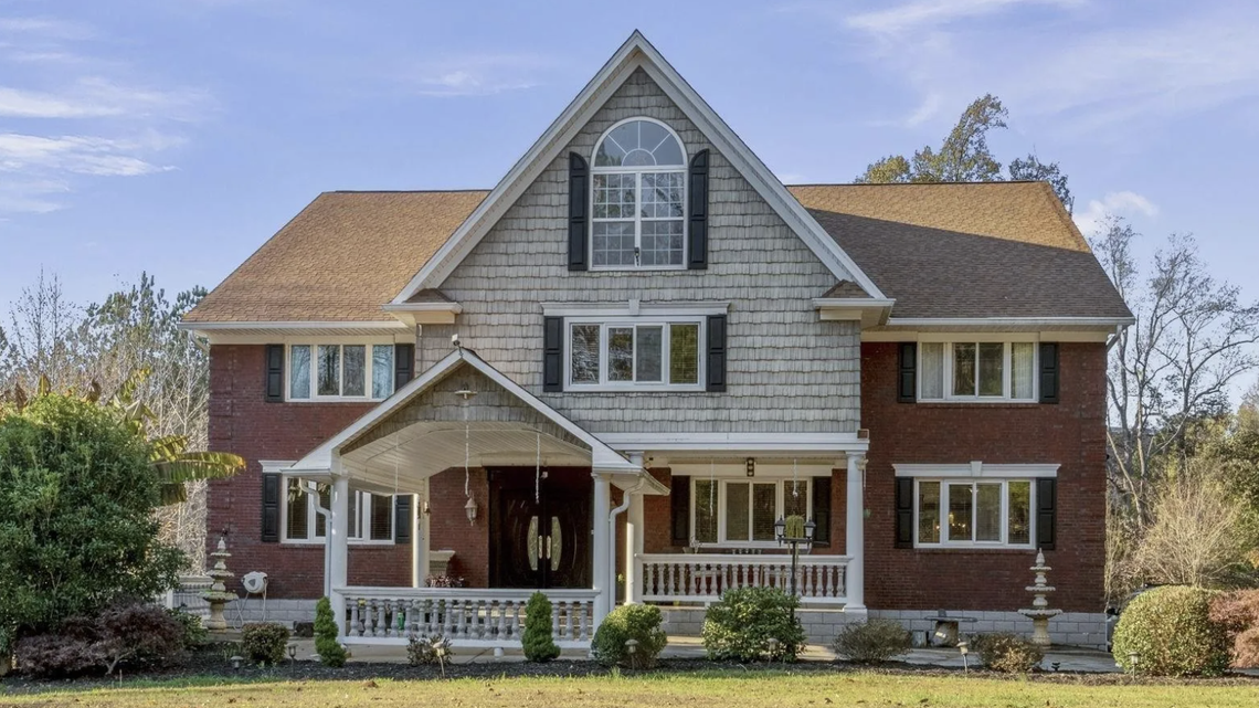 The house on Griffin Mill Court is traditional outside, Asian inside.