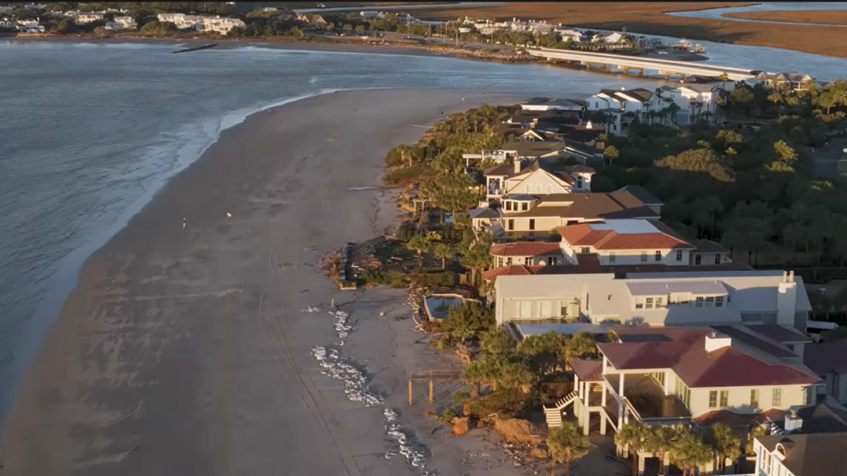 Development on the beach at the Isle of Palms shows a seawall extending well onto the shoreline beyond other properties. Beach house owner Rom Reddy says work he did along the beach is not in state jurisdiction. But state regulators say the construction juts onto the eroding beach and is in violation of state law. Seawalls can worsen beach erosion and block public access along the seashore.