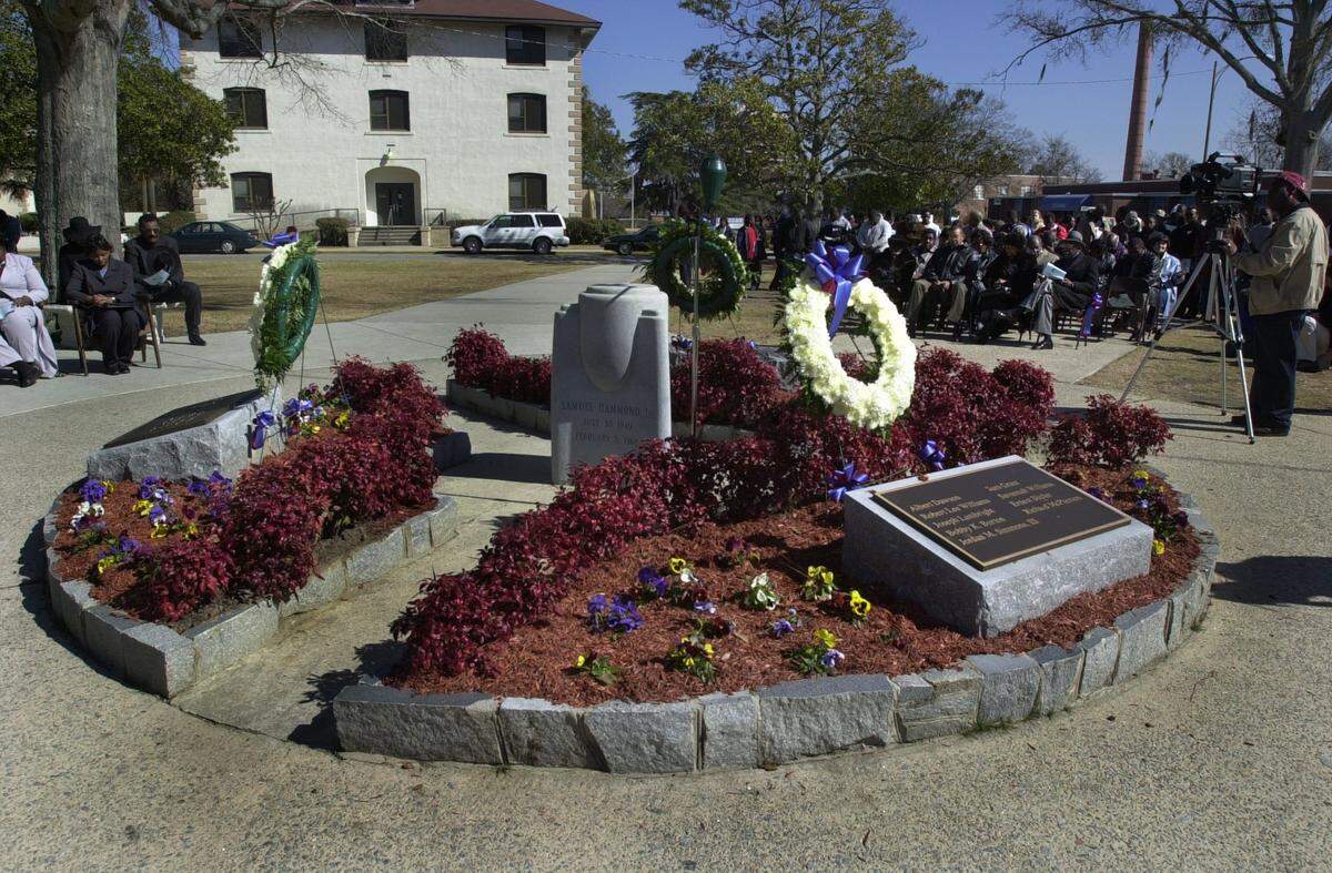 Saturday marked the annual memorial service recognizing the Orangeburg Massacre when, 35 years ago, three SC State students were killed by law enforcement in an attempt to integrate the local Orangeburg bowling alley. This monument on campus recognizes the efforts of those students. The center stone is engraved with the names of the three students killed and the surrounding bronze plaques list the name of 27 others wounded during the event. 2/8/03