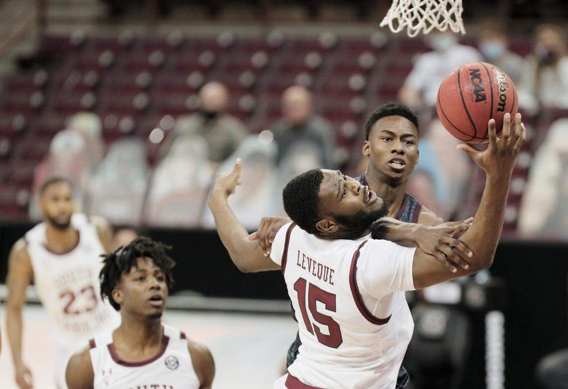 South Carolina Gamecocks forward Wildens Leveque (15) defends against Texas A&M Aggies guard Jaxson Robinson (4) at Colonial Life Arena on Wednesday, January 6, 2021.