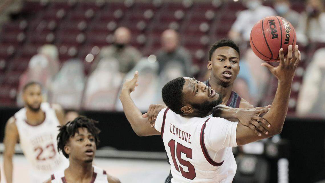 South Carolina Gamecocks forward Wildens Leveque (15) defends against Texas A&M Aggies guard Jaxson Robinson (4) at Colonial Life Arena on Wednesday, January 6, 2021.