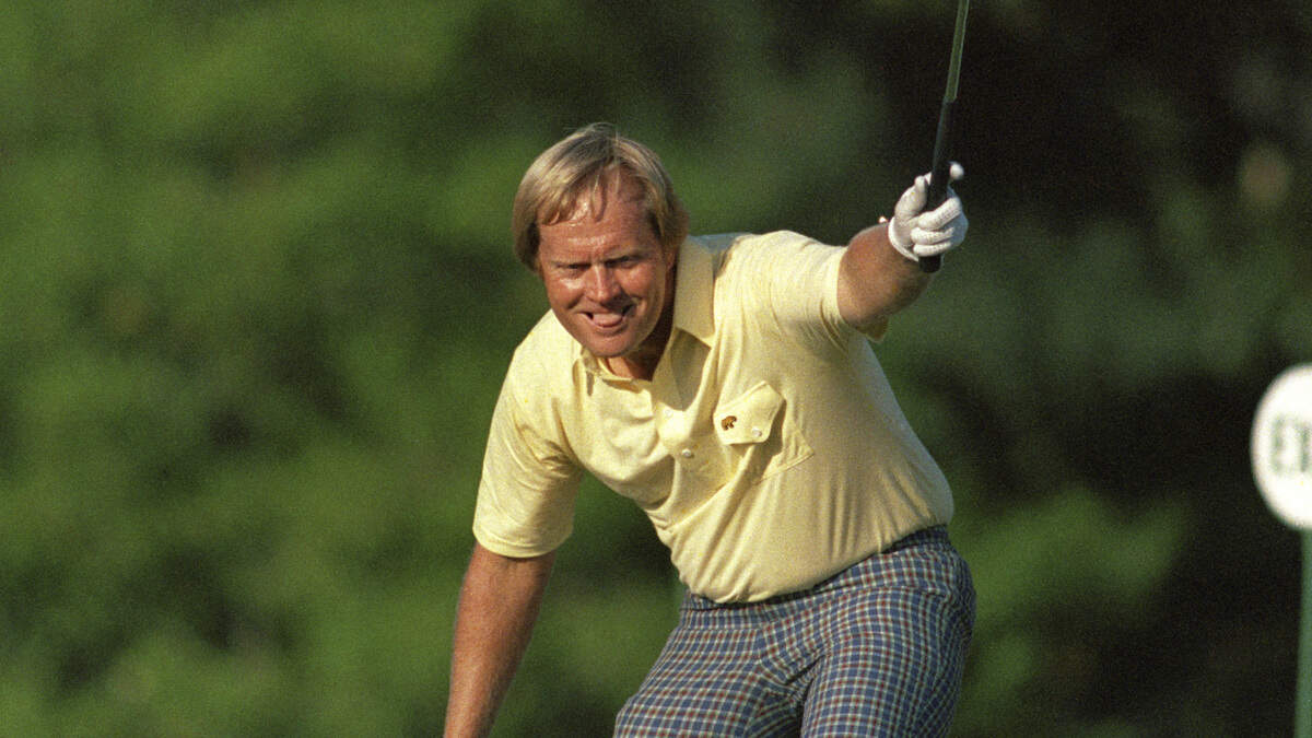 FILE - In this April 13, 1986, file photo, Jack Nicklaus watches his putt drop for a birdie on the 17th hole during the Masters golf tournament at Augusta National in Augusta, Ga. Nicklaus turns 80 on Tuesday, Jan. 21, 2020, and still remains a big part of golf conversations. (AP Photo/Phil Sandlin, File)