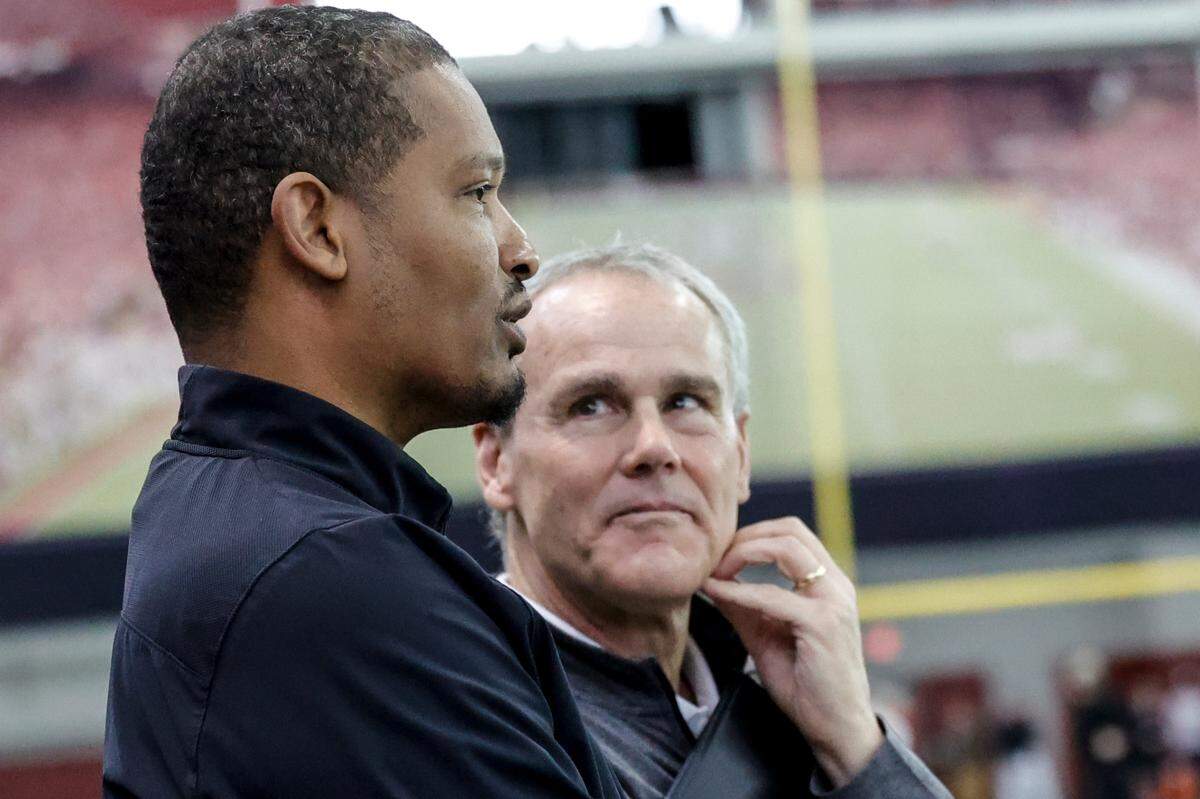 University of South Carolina Head Basketball Coach Lamont Paris speaks with Associate Athletic Director of Communications and Public Relations,Steve Fink during spring practice inside the Je,rri and Steve Spurrier Indoor Practice Facility on Thursday, April, 11, 2024.