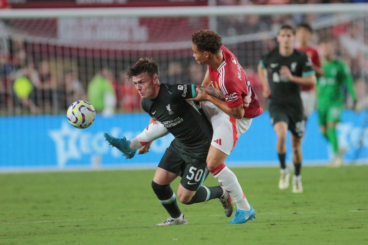 Manchester United’s Sam Murray (61) collides with Liverpool’s Ben Dock (50) during a pre-season match on Saturday, Aug. 3, 2024 at Williams-Brice Stadium.