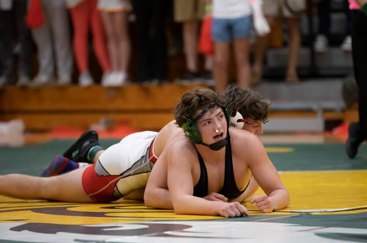 Austin Huff of Ben Lippen is taken down by Aiden Palisin of the Hammond School during the SCISA 2022 Duals State Wrestling Tournament at Ben Lippen on Saturday, February 5, 2022.