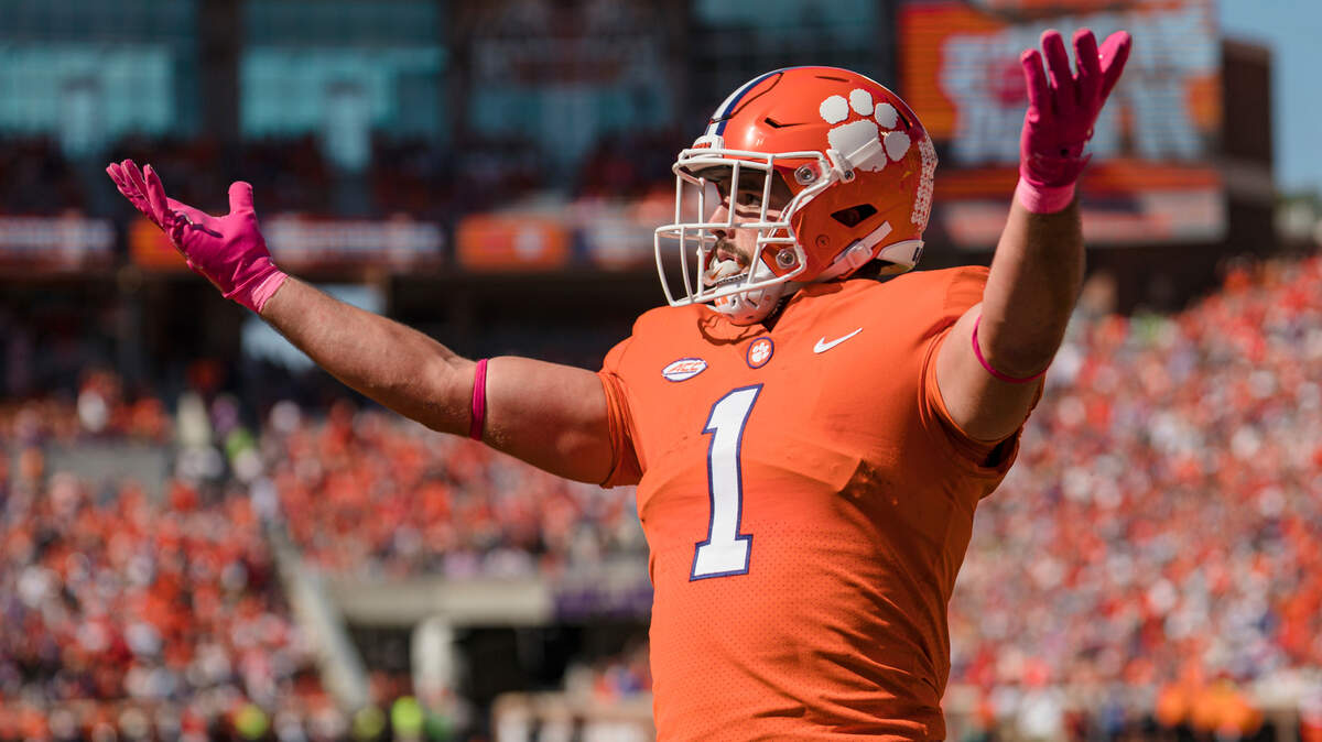 Clemson running back Will Shipley (1) reacts after scoring a touchdown during the first half of an NCAA college football game against Syracuse on Saturday, Oct. 22, 2022, in Clemson, S.C. (AP Photo/Jacob Kupferman)
