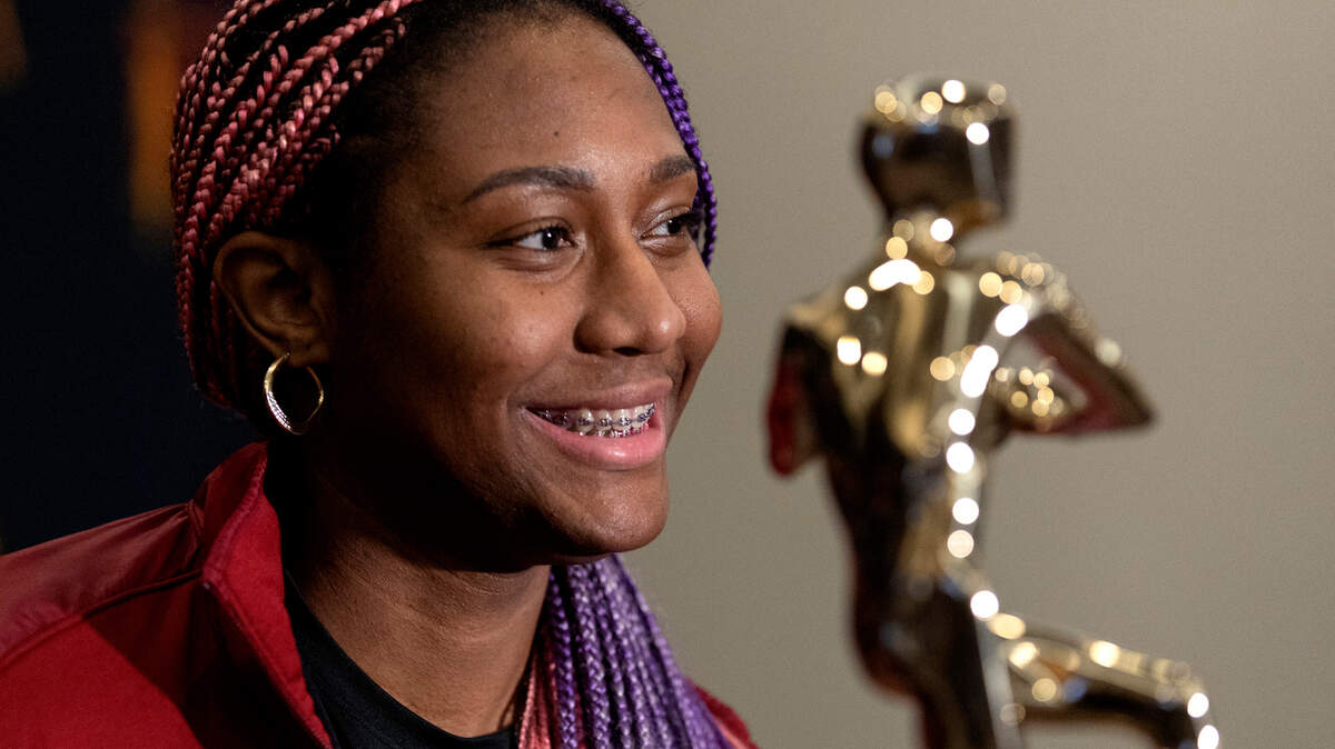 South Carolina’s Aliyah Boston poses with the trophy after being named 2022 Naismith Women’s College Player of the Year, Wednesday, March 30, 2022, in Minneapolis. (Carlos Gonzalez/Star Tribune via AP)