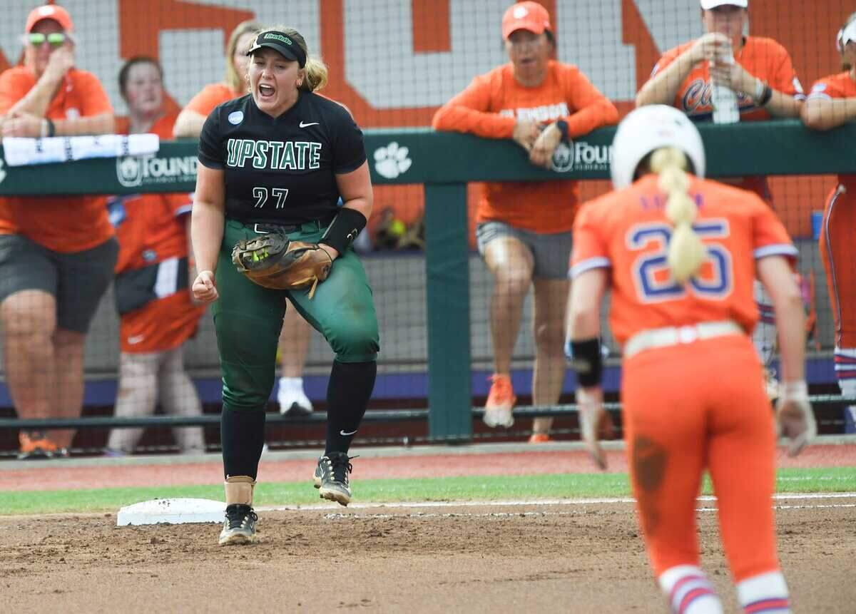 USC Upstate junior Carson Shaw (27) reacts as Clemson senior Maddie Moore (28) is out at first base in a double play, during the bottom of the first inning of the NCAA Softball Tournament Clemson Regional at McWhorter Stadium in Clemson Friday, May 16, 2025.