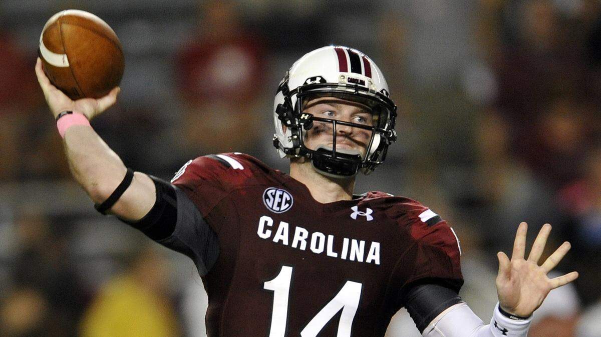South Carolina quarterback Connor Shaw throws during the first half of an NCAA college football game against Kentucky, Saturday, Oct. 5, 2013, in Columbia, S.C.