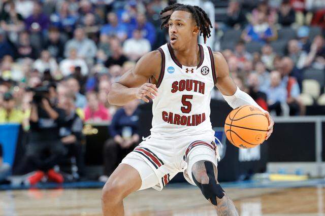 South Carolina guard Meechie Johnson (5) plays the Oregon Ducks at the PPG Paints Arena on Thursday, March 21, 2024.