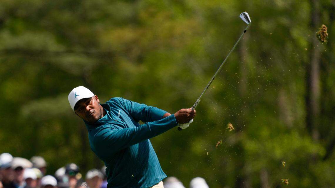 Harold Varner III tees off on the 12th hole during the second round at the Masters golf tournament on Friday, April 8, 2022, in Augusta, Ga. (AP Photo/Charlie Riedel)
