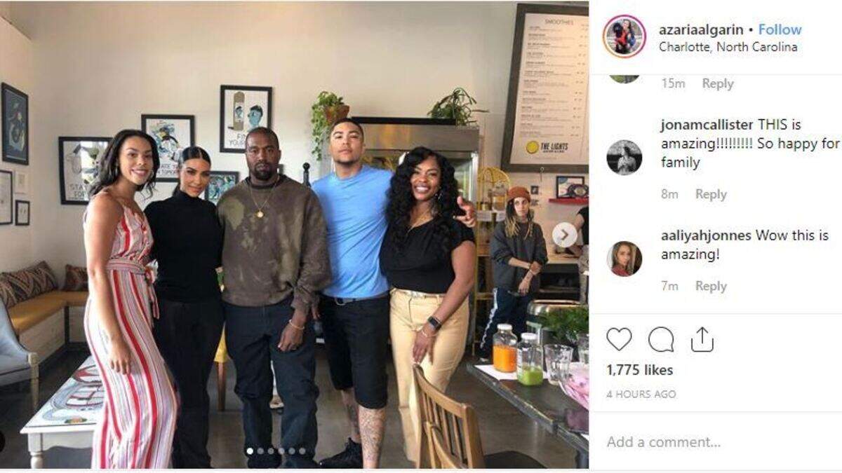 Kim Kardashian, second from left, and husband Kanye West, center, visited Charlotte to see a man recently released from prison.