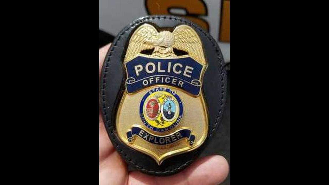 This is the gold-colored badge marked “Police Officer Explorer” that Pickens County sheriff’s deputies confiscated from a suspect charged with impersonating a law enforcement officer.