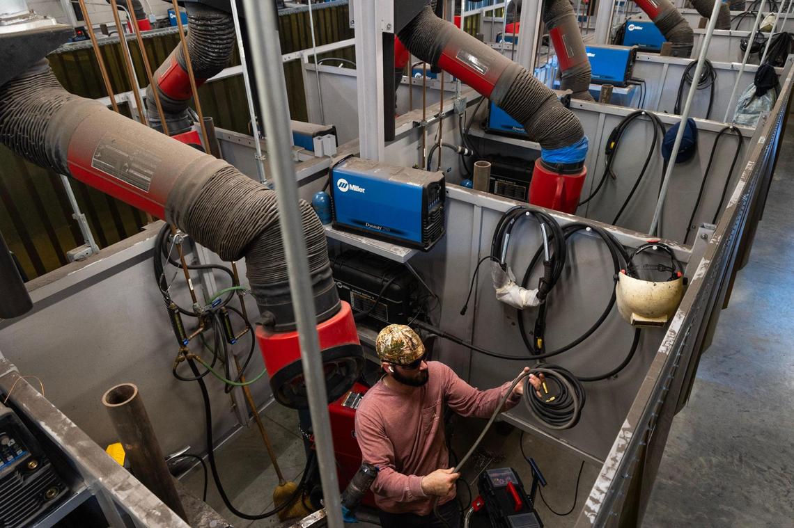 Connor Carson packs up welding equipment at Midlands Technical College on Tuesday, March 5, 2024. Carson is taking a certification course with the college for his job at Dominion Energy.