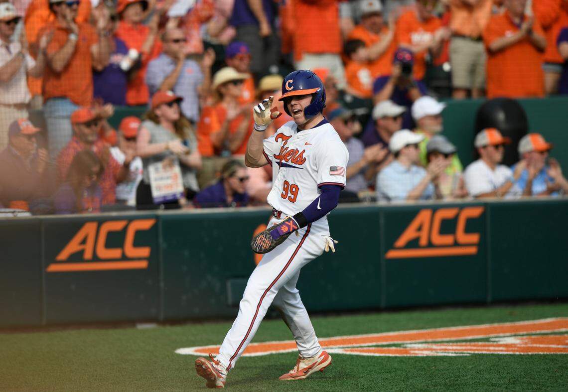 Clemson’s Nate Savoie scores Sunday in the Tigers’ rivalry game against South Carolina at Doug Kingsmore Stadium.