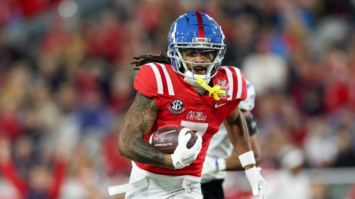Mississippi Rebels wide receiver Antwane Wells Jr. (7) runs for a touchdown against the Duke Blue Devils in the first quarter during the Gator Bowl at EverBank Stadium.