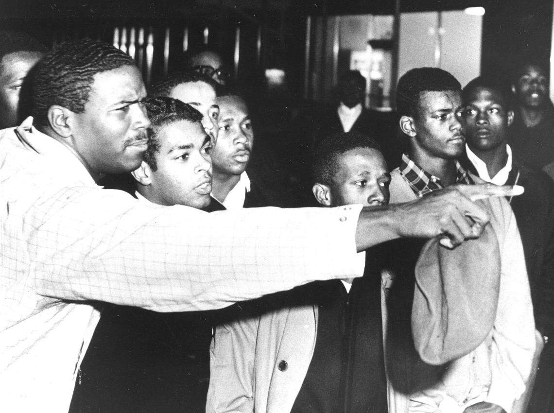 Tyrone Caldwell, then a student at a South Carolina State College, shakes his finger at law officers after arrests were made when black students were barred from an all-white, private bowling alley in Orangeburg, S.C., Feb. 6, 1968. Protesters who watched three of their own gunned down by state troopers during a rally on the outskirts of South Carolina State University in February 1968 hoped the deaths of the three black students would echo throughout the history of the civil rights movement.