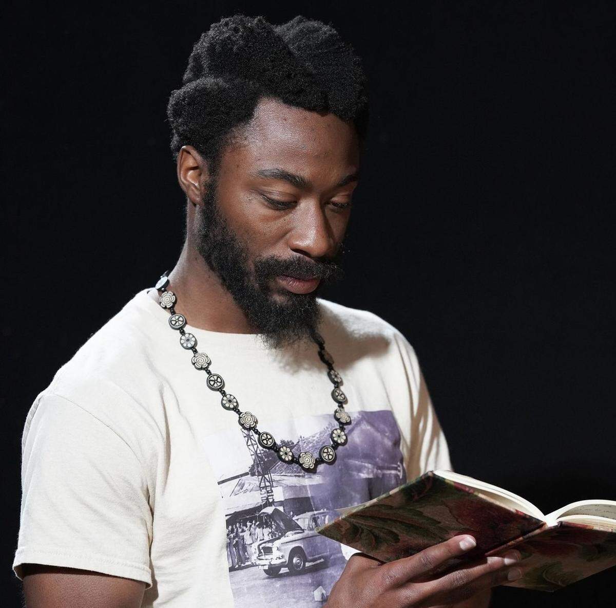 Marcus Lattimore performs poetry at different open mics around Portland every week.