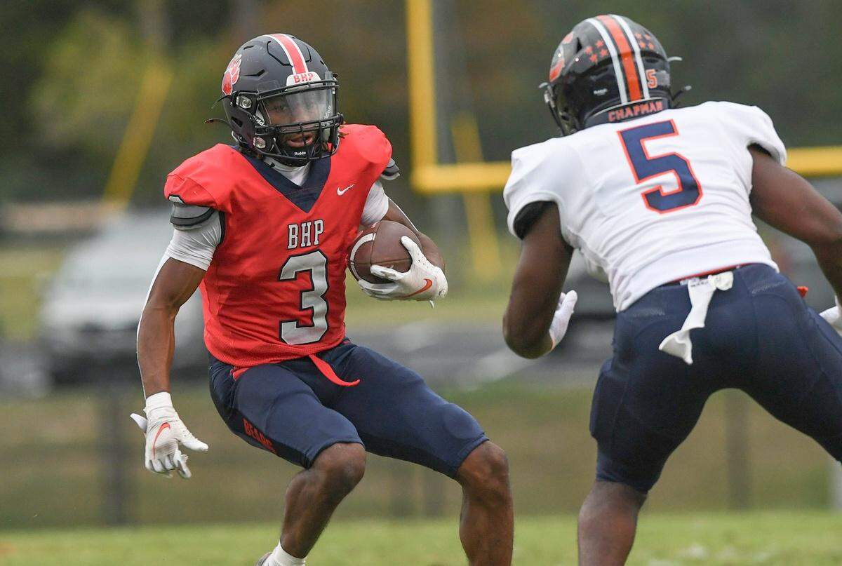Belton-Honea Path High senior Marquise Henderson (3) runs near Chapman High junior Chanson Mickles (5) during the first quarter at Belton-Honea Path High in Honea Path, S.C. Wednesday, September 25, 2024.