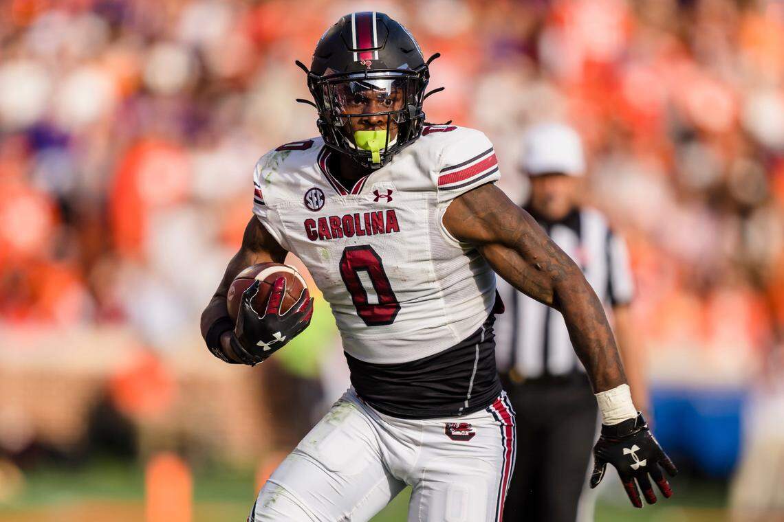 South Carolina tight end Jaheim Bell runs with the ball in the second half of an NCAA college football game against Clemson on Saturday, Nov. 26, 2022, in Clemson, S.C.
