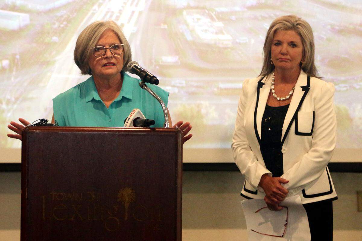 State Sent. Katrina Shealy (left) and Lexington Mayor Hazel Livingston address the crowd at a June 18, 2024 press conference revealing details for the Sunset Split traffic project.