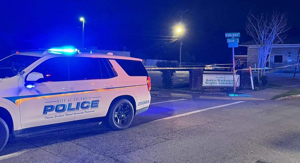 Members of the Columbia Police Department investigate a shooting.