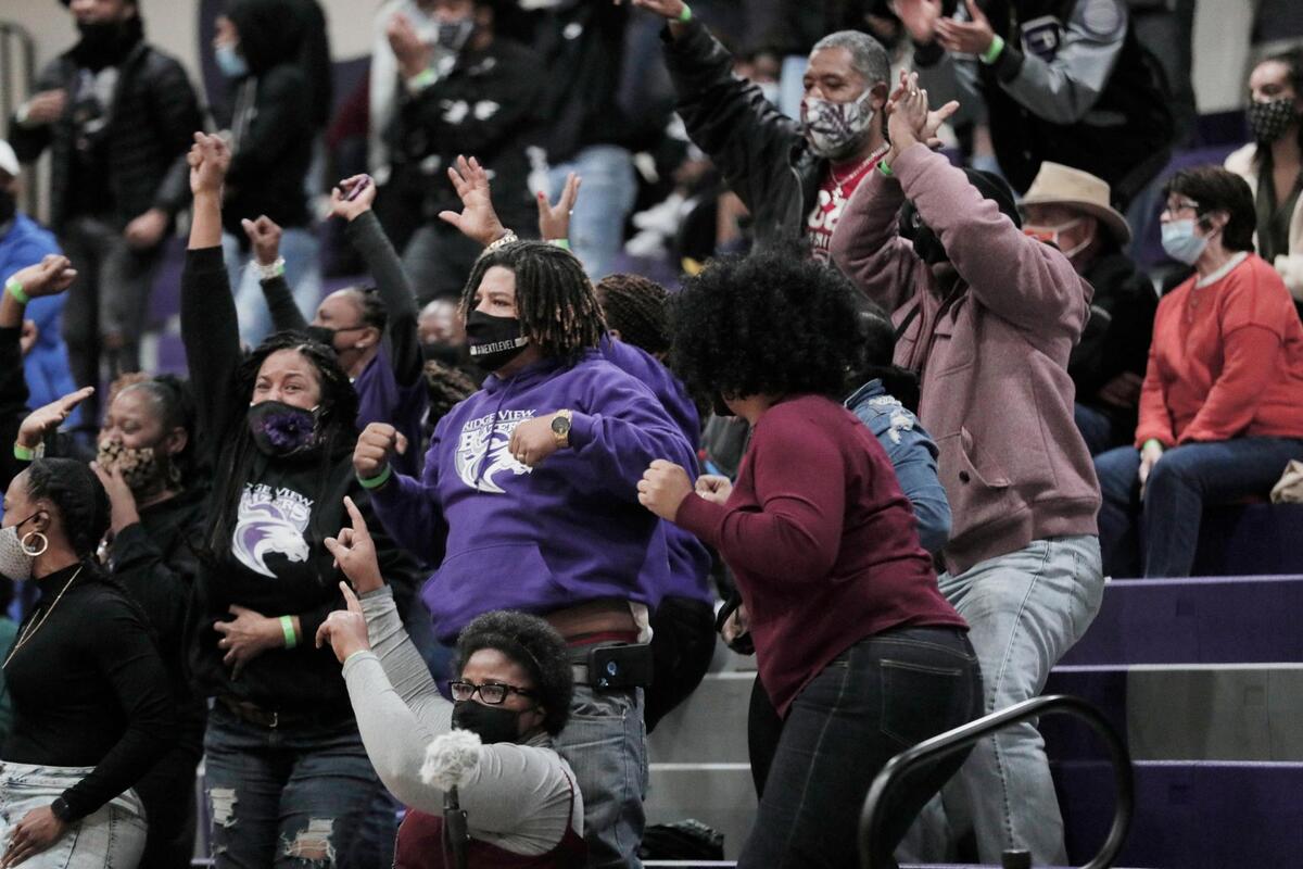 Ridge View fans celebrate the team scoring against Dorman on Friday, February 26, 2021. The school limited capacity in the stadium, and most fans cooperated with the mask policy.
