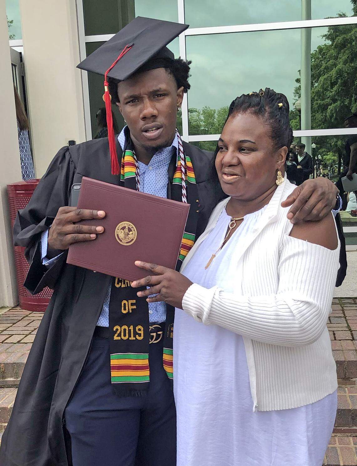 Tevin Mack and his mom Paula at his Alabama graduation.