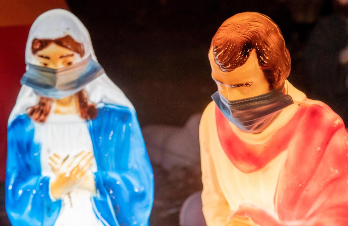 A holiday light display on Hudson Street in West Columbia, South Carolina on Wednesday, December 23, 2020. The display featured a Mary and Joseph wearing masks.