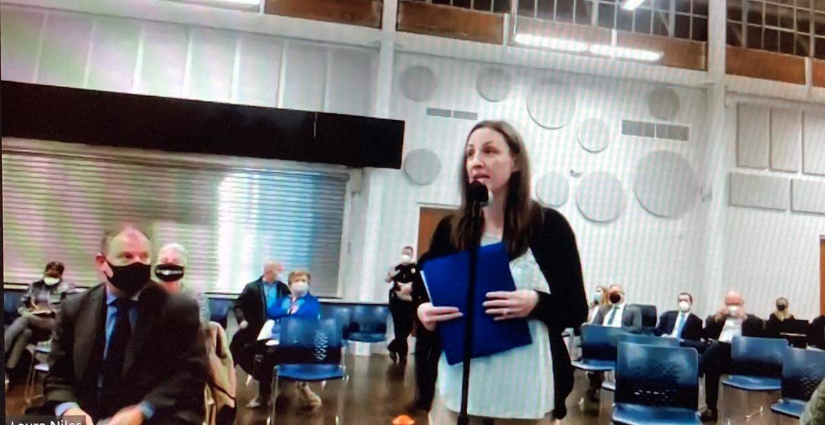 A woman speaks during a January 2022 EPA hearing about the New Indy paper company in York County, SC. Dozens of people living near the plant urged tighter controls. The plant has generated thousands of odor complaints.