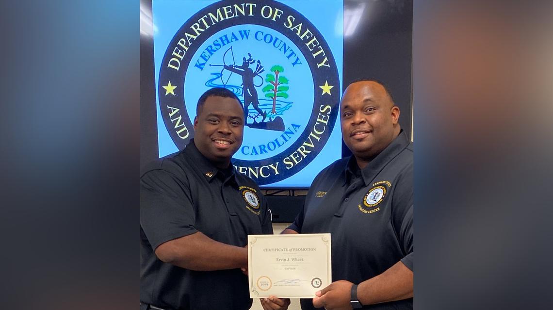 Ervin Whack, lieutenant of administration at Kershaw detention center, and Tyrell Cato, former jail director, pose for a portrait in celebration of Whack’s promotion.