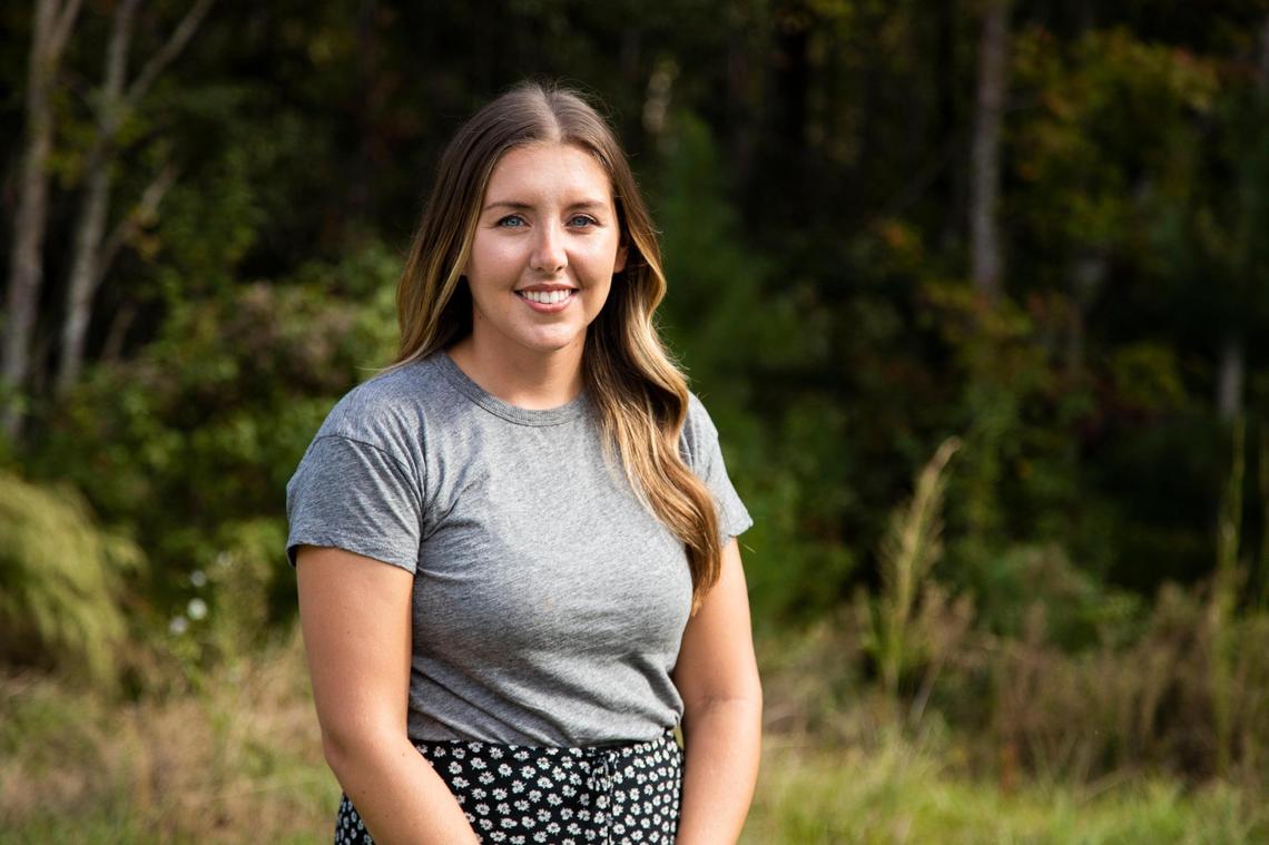 Emily Todd poses for a portrait at her home on Friday, October 23, 2020. Todd was a public school teacher, and left the classroom over frustrations caused by lack of funding. She is voting for Democratic Party candidates she believes will fund schools and listen to teachers.