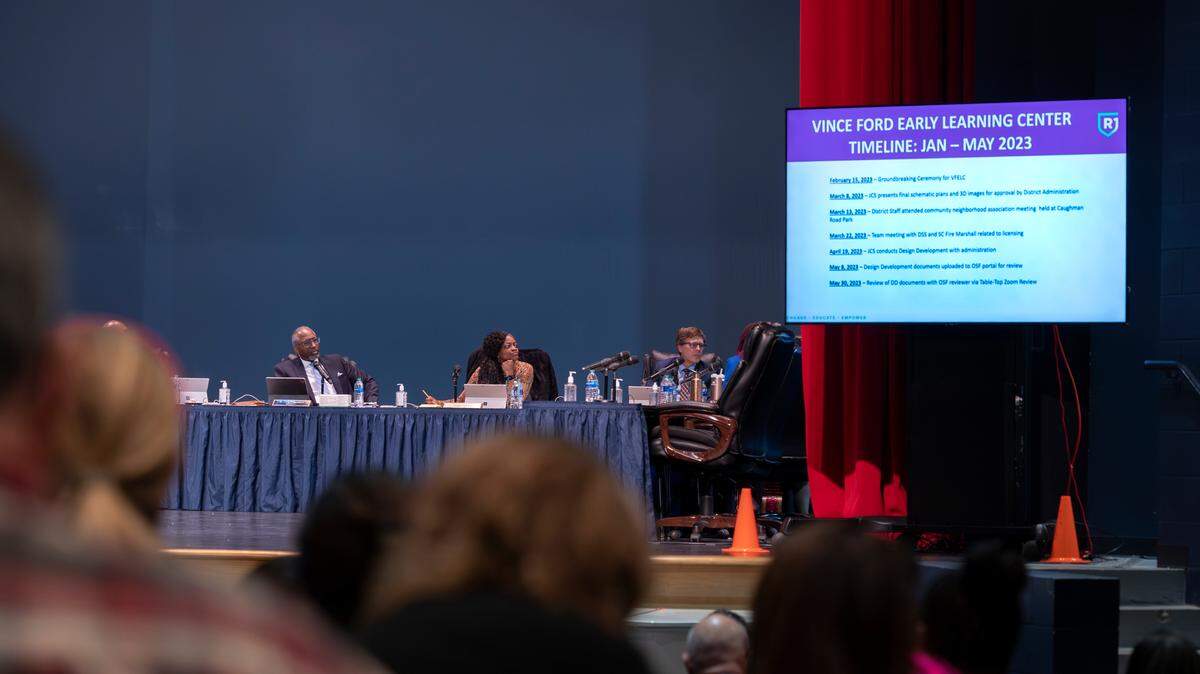 Richland District One school board members listen to a presentation on the timeline of the development of the Vince Ford Early Learning Center during a school board meeting at A. C. Flora high school on Tuesday, Jan. 23, 2024