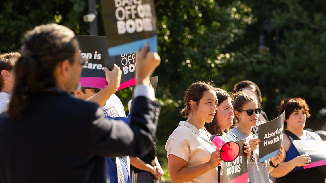 Protestors speak out against the South Carolina Supreme Court’s decision to uphold a six-week abortion ban on Wednesday, August 23, 2023. Protestors say that since many people do not know they are pregnant before six weeks, it is effectively a ban.
