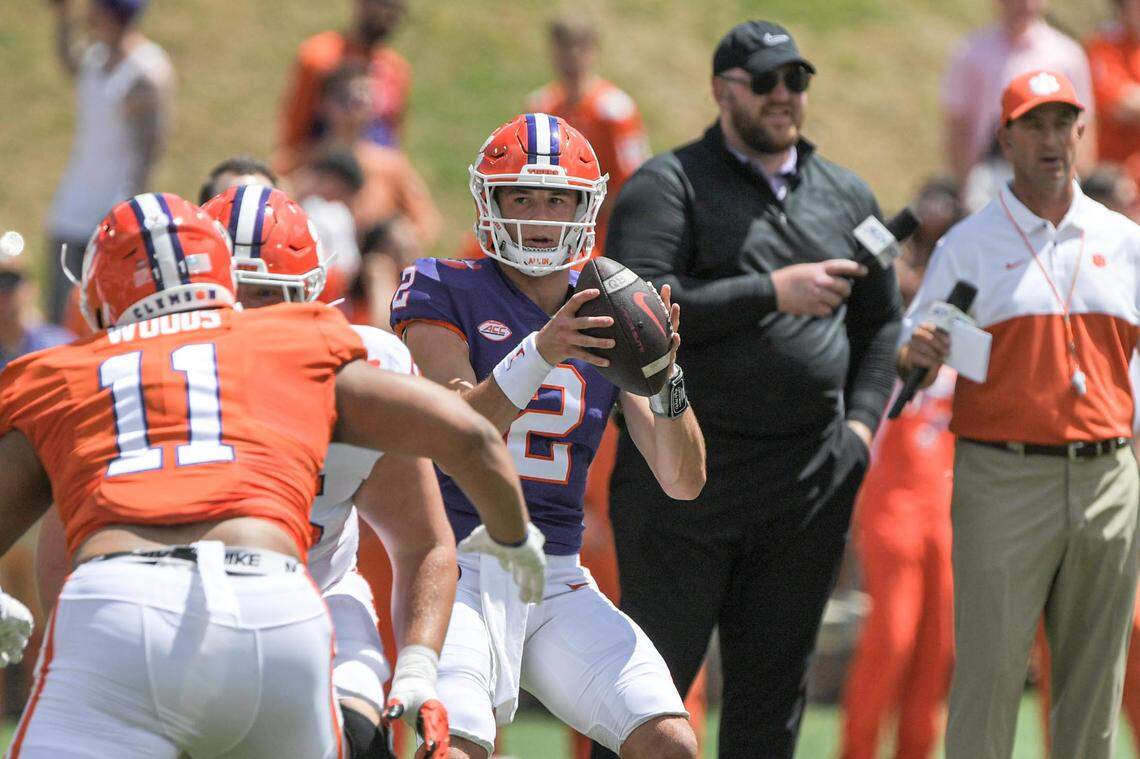 April 15, 2023; Clemson, SC , USA; Clemson quarterback Cade Klubnik (2) fades back to pass near Clemson defensive lineman Peter Woods (11) during the first quarter the annual Orange and White Spring game at Memorial Stadium in Clemson, S.C. Saturday, April 15, 2023. Mandatory Credit: Ken Ruinard-USA TODAY NETWORK
