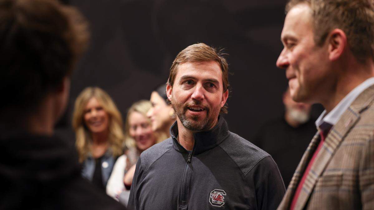 South Carolina offensive coordinator Kendal Briles speaks with athletics director Jeremiah Donati during a press conference in Columbia on Friday, December 12, 2025.


