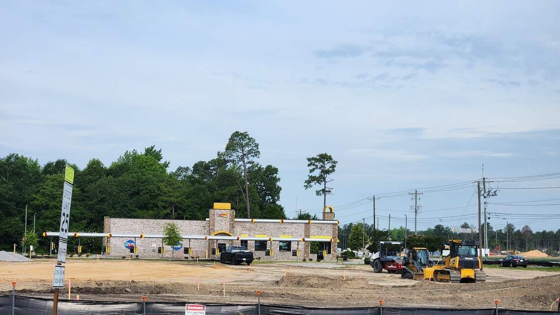 What new business is being planned beside Lexington High School? What we know