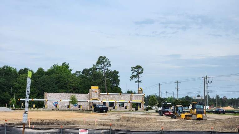 What new business is being planned beside Lexington High School? What we know