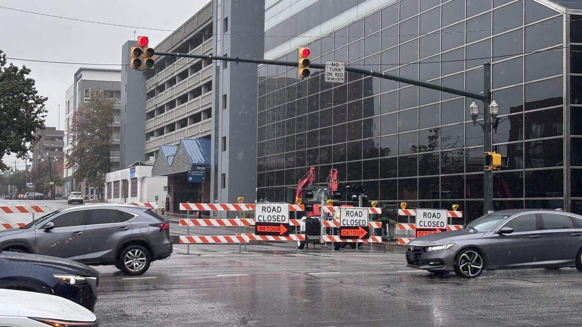 A portion of Assembly Street in downtown Columbia is closed as contractors work to repair a sinkhole near the intersection of Gervais and Assembly streets, around the corner from the South Carolina Statehouse.