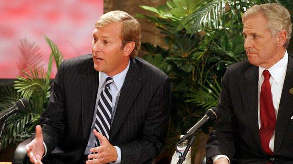 Then-Attorney General Henry McMaster listens as Charleston attorney Mullins McLeod answers a question during the debate in the 2010 governor’s race.