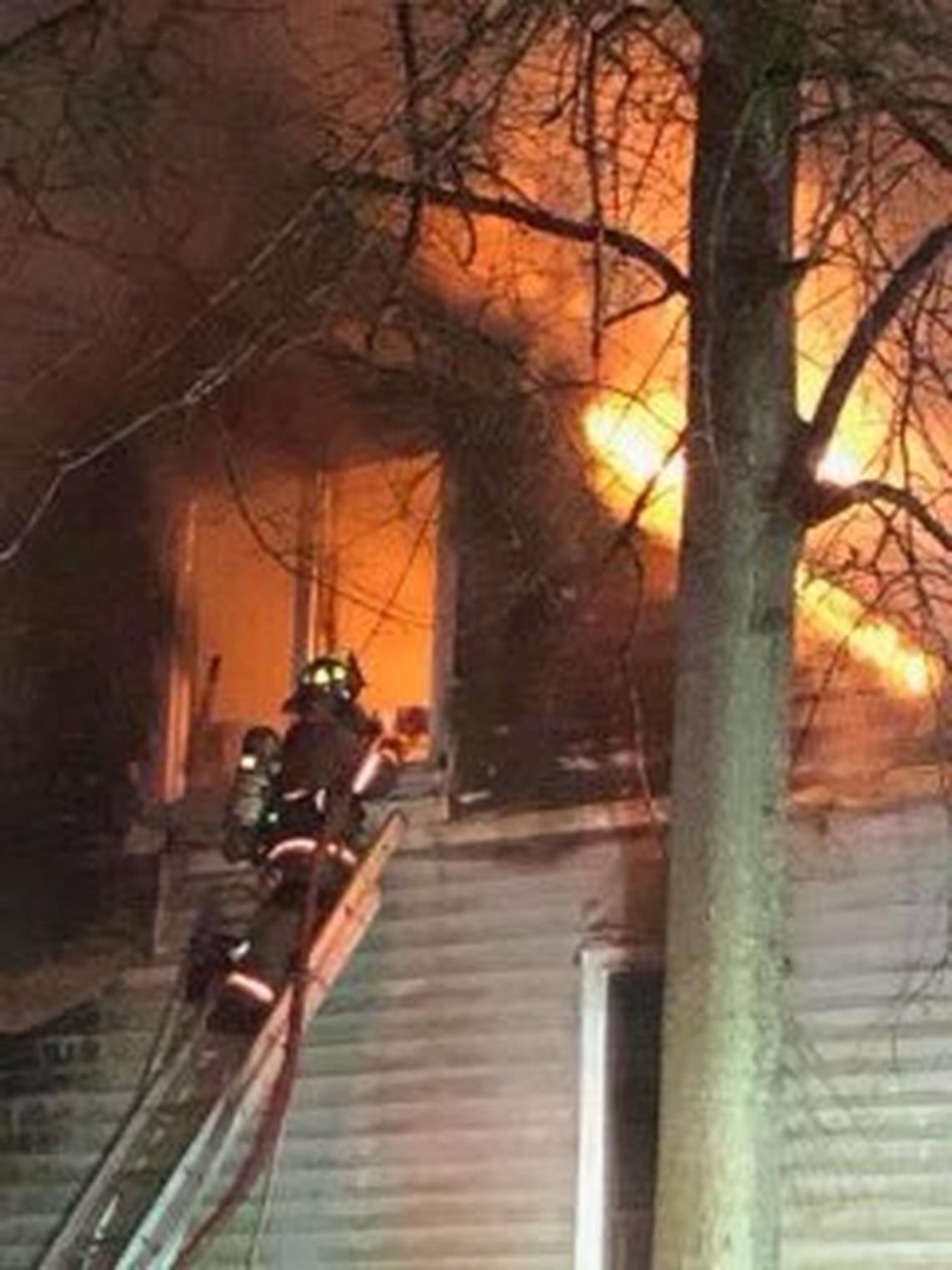 Fire fighters battle a burning building in Lexington County.